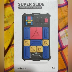 Super Slide Handheld Puzzle Console - Black with Blue/Red/Yellow Blocks